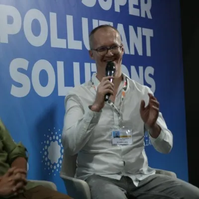 Janek Vähk speaking at an event